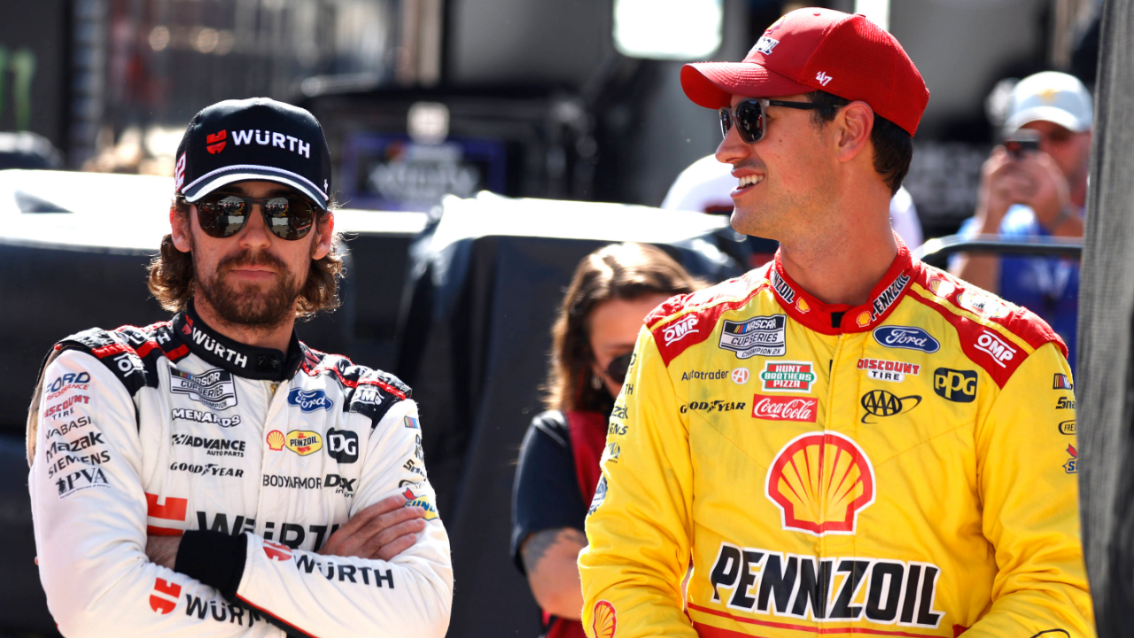 BRISTOL, TN - SEPTEMBER 20: Joey Logano ( 22 Team Penske Shell Pennzoil Ford) talks with Ryan Blaney ( 12 Team Penske Wurth Ford) during practice for the Cup Series Bass Pro Shops Night Race on September 20, 2024 at Bristol Motor Speedway in Bristol, TN. (Photo by Jeff Robinson Icon Sportswire) AUTO: SEP 20 NASCAR Cup Series Bass Pro Shops Night Race EDITORIAL USE ONLY Icon2409201845