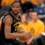 ; Golden State Warriors forward Jonathan Kuminga (00) holds onto the ball against the Minnesota Timberwolves in the fourth quarter during game four of the second round for the 2025 NBA Playoffs at Chase Center.