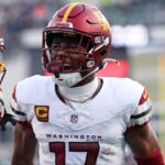 Washington Commanders wide receiver Terry McLaurin (17) reacts after a play with wide receiver Olamide Zaccheaus (14) against the Philadelphia Eagles during the first half in the NFC Championship game at Lincoln Financial Field.