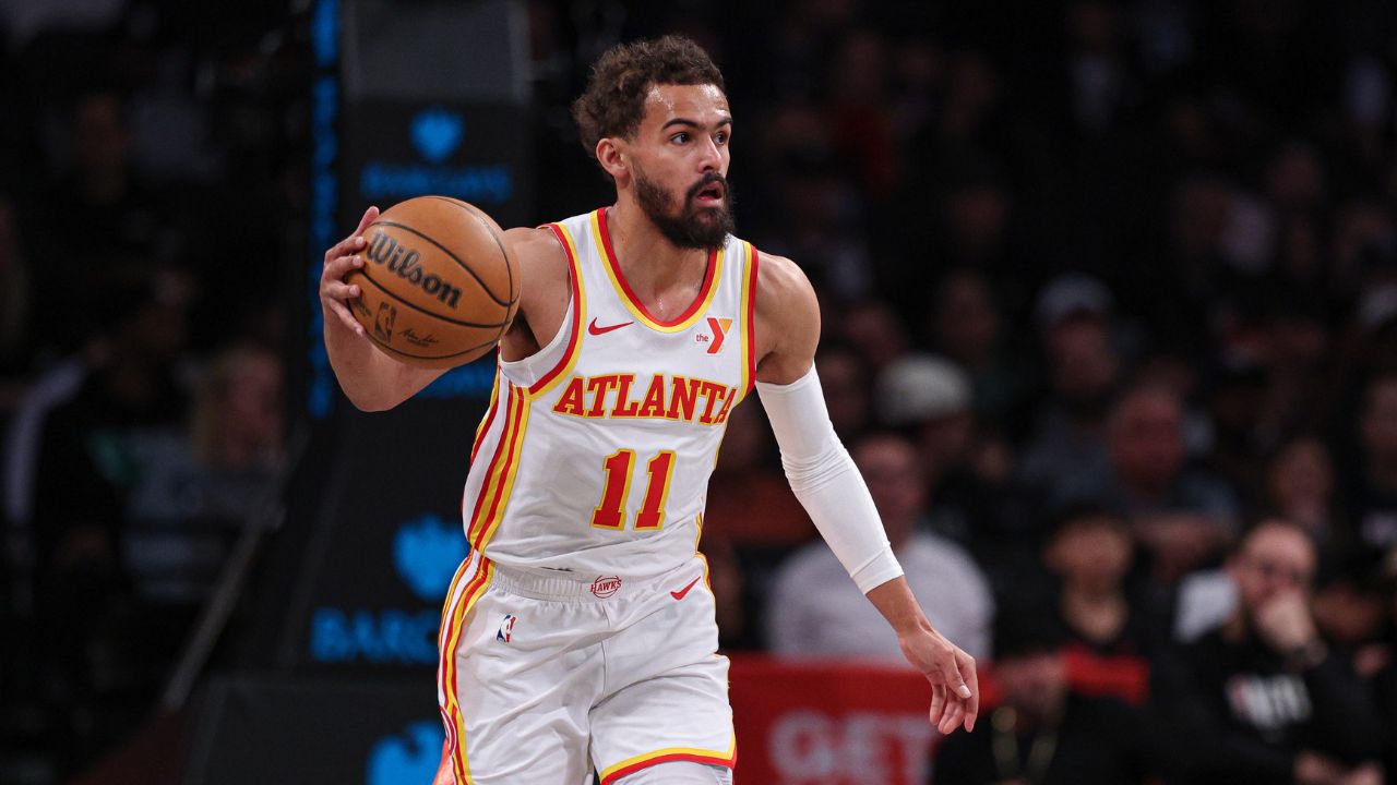 Atlanta Hawks guard Trae Young (11) dribbles up court during the first quarter against the Brooklyn Nets at Barclays Center.