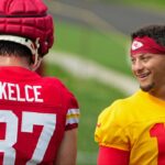 Kansas City Chiefs quarterback Patrick Mahomes (15) laughs with tight end Travis Kelce (87) during training camp at Missouri Western State University.
