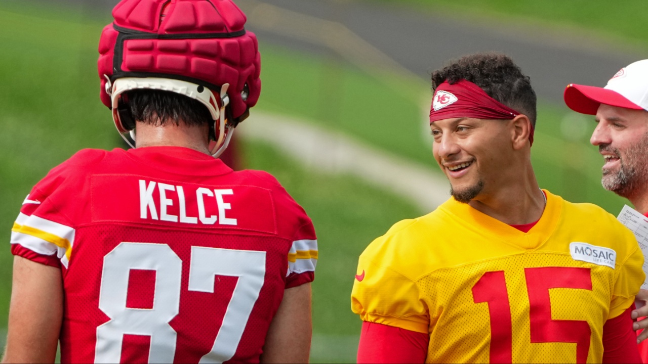 Kansas City Chiefs quarterback Patrick Mahomes (15) laughs with tight end Travis Kelce (87) during training camp at Missouri Western State University.
