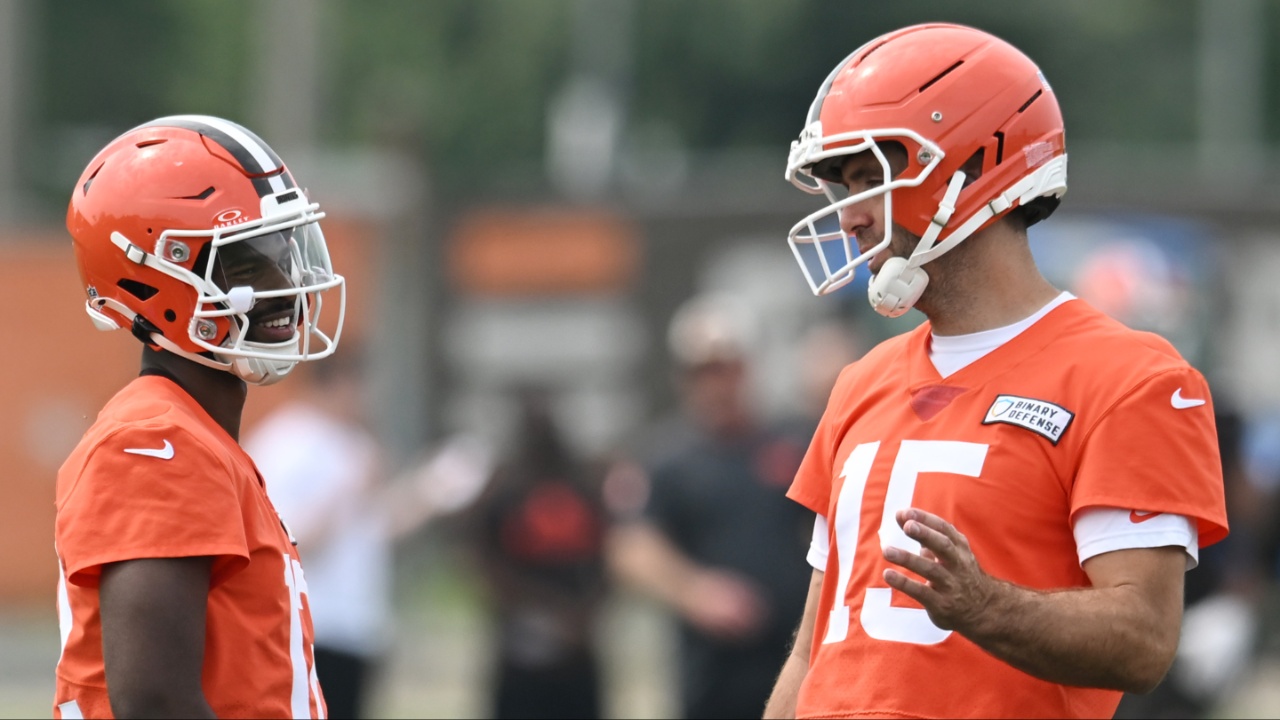 Cleveland Browns quarterback Joe Flacco (15) talks to quarterback Shedeur Sanders (12) during mini camp at CrossCountry Mortgage Campus.