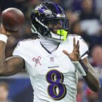 Dec 15, 2024; Houston, Texas, USA; Baltimore Ravens quarterback Lamar Jackson (8) throws the ball during the second quarter against the Houston Texans at NRG Stadium.