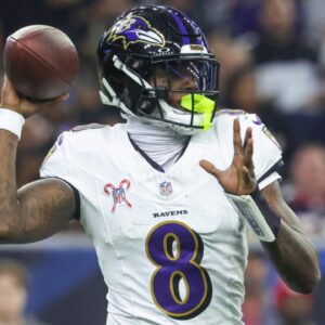 Dec 15, 2024; Houston, Texas, USA; Baltimore Ravens quarterback Lamar Jackson (8) throws the ball during the second quarter against the Houston Texans at NRG Stadium.
