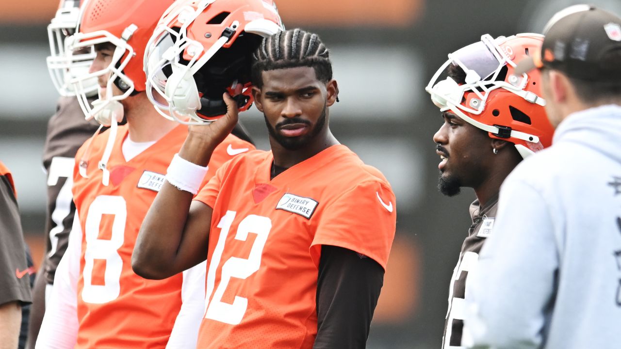 Cleveland Browns quarterback Shedeur Sanders (12) listens to a play call during mini camp at CrossCountry Mortgage Campus.