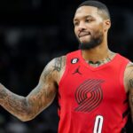 Portland Trail Blazers guard Damian Lillard (0) looks on during the fourth quarter against the Minnesota Timberwolves at Target Center.