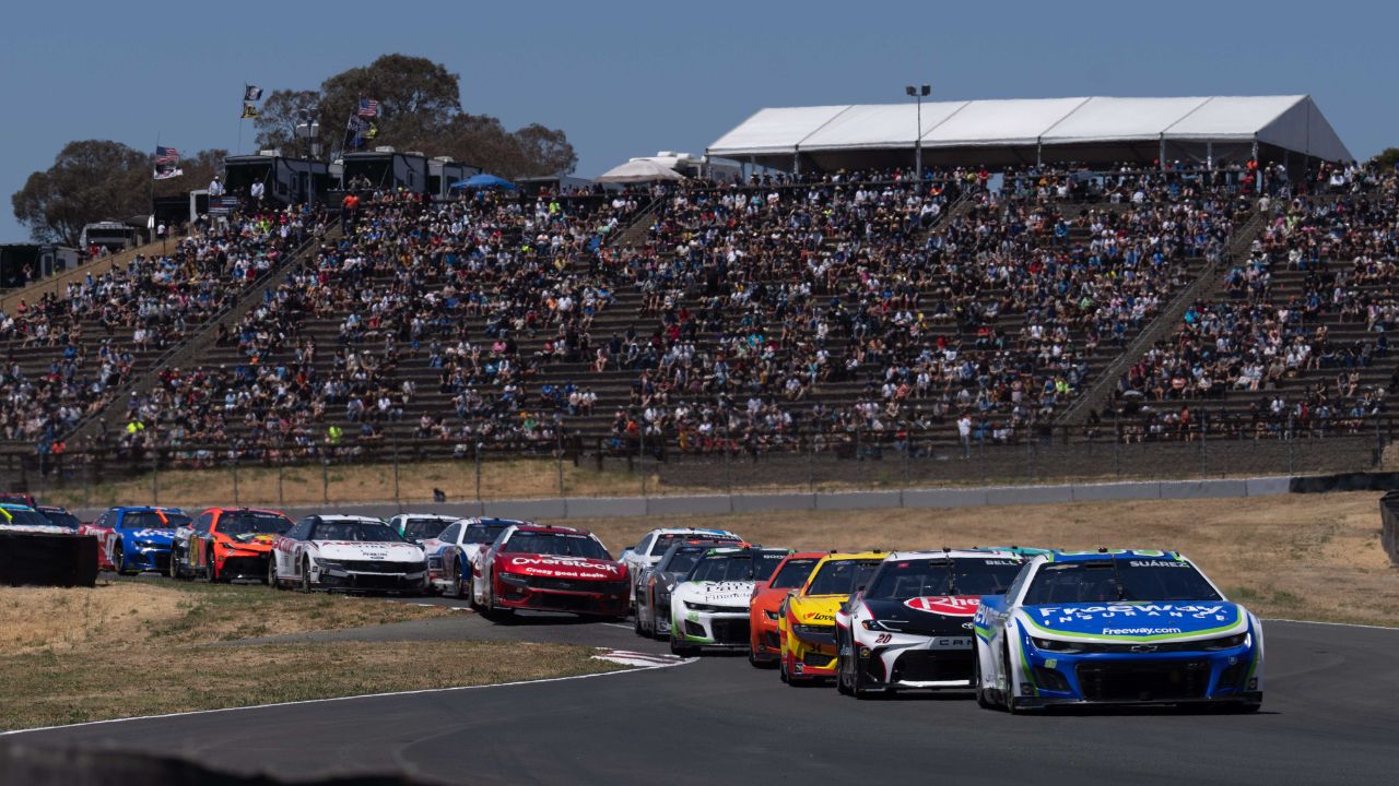 NASCAR Cup Series driver Daniel Suarez (99) leads the group during the Toyota / Save Mart 350 at Sonoma Raceway.