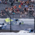 NASCAR Xfinity Series driver Austin Hill (21) and NASCAR Xfinity Series driver Aric Almirola (19) collide Saturday, July 26, 2025, during the Pennzoil 250 at Indianapolis Motor Speedway.