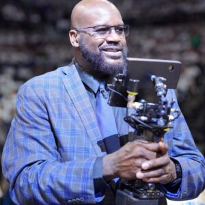 Shaquille O'Neal looks on during halftime between the Minnesota Timberwolves and the Dallas Mavericks during game two of the western conference finals for the 2024 NBA playoffs at Target Center.