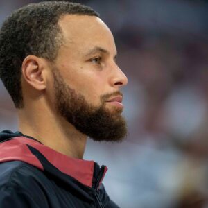 May 8, 2025; Minneapolis, Minnesota, USA; Golden State Warriors guard Stephen Curry (30) looks on from the bench against the Minnesota Timberwolves in the second half during game two of the second round for the 2025 NBA Playoffs at Target Center
