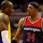 Washington Wizards forward Paul Pierce (34) talks to Los Angeles Lakers guard Kobe Bryant (24) in the third quarter at Verizon Center. The Wizards won 111-95.