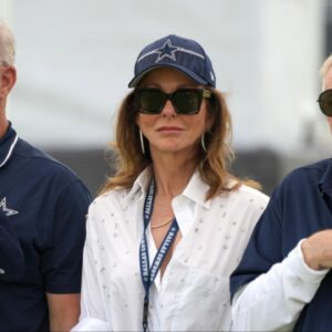 Dallas Cowboys chief operating officer Stephen Jones (left) and chief brand officer Charlotte Jones (center) and owner Jerry Jones during training camp opening ceremonies at the River Ridge Fields.