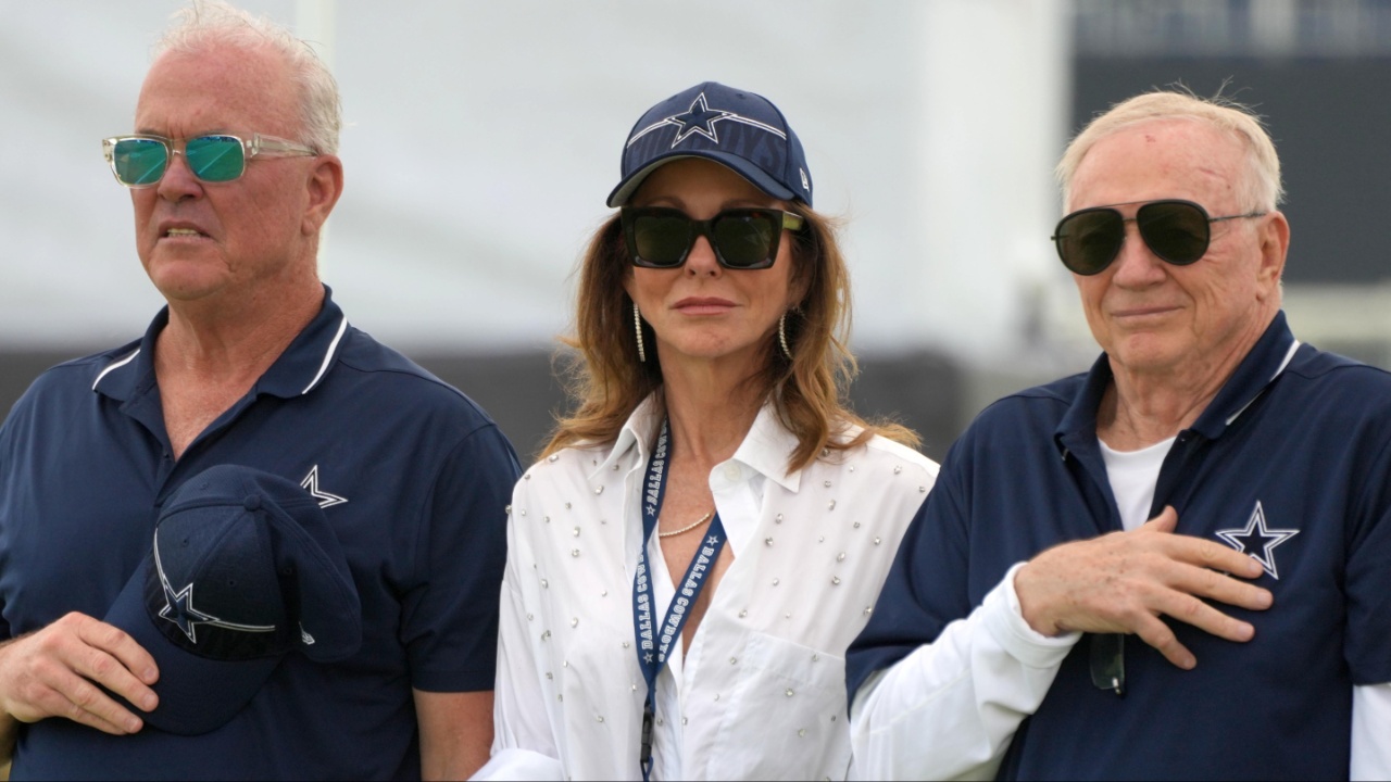 Dallas Cowboys chief operating officer Stephen Jones (left) and chief brand officer Charlotte Jones (center) and owner Jerry Jones during training camp opening ceremonies at the River Ridge Fields.