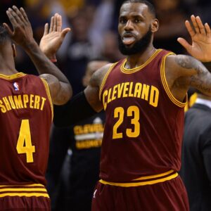Jan 8, 2017; Phoenix, AZ, USA; Cleveland Cavaliers forward LeBron James (23) slaps hands with Cleveland Cavaliers guard Iman Shumpert (4) during the first half against the Phoenix Suns at Talking Stick Resort Arena.