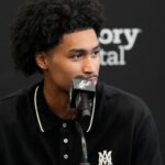 Jun 28, 2025; San Antonio, TX, USA; San Antonio Spurs first round draft pick Dylan Harper answers questions during press conference at Victory Capital Performance Center.