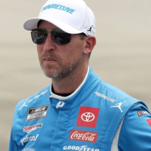 NASCAR Cup Series driver Denny Hamlin stands on pit road prior to the Autotrader EchoPark Automotive 400 at Dover Motor Speedway.