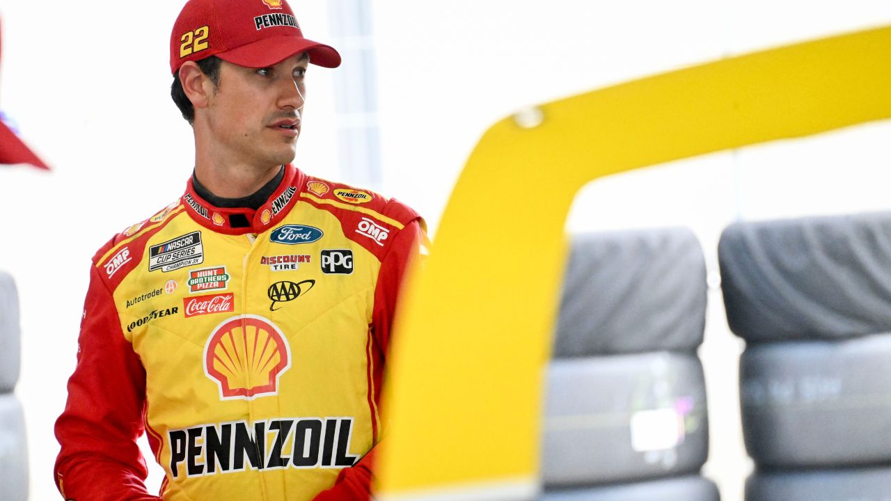 NASCAR Cup Series driver Joey Logano (22) stands in his garage Friday, July 25, 2025, ahead of practice at Indianapolis Motor Speedway in preparation for the Brickyard 400.