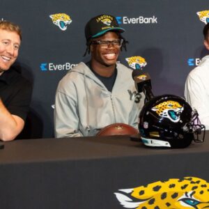 Liam Coen, Travis Hunter, and James Gladstone