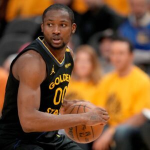 Golden State Warriors forward Jonathan Kuminga (00) holds onto the ball against the Minnesota Timberwolves in the fourth quarter during game four of the second round for the 2025 NBA Playoffs at Chase Center.