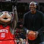 Houston Rockets former player and NBA Hall of Fame member Hakeem Olajuwon attempts a ceremonial free throw before a game against the San Antonio Spurs at Toyota Center.