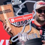 NASCAR Cup Series driver Shane van Gisbergen (88) poses for a photo with the trophy after winning the NASCAR Toyota / Save Mart 350 at Sonoma Raceway.