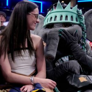 Caitlin Clark with Liberty mascot Ellie