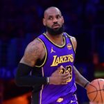 Los Angeles Lakers forward LeBron James (23) dribbles the ball against the Dallas Mavericks during the second half at Crypto.com Arena