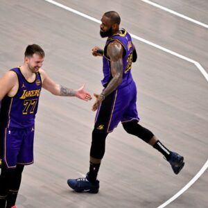 Los Angeles Lakers guard Luka Doncic (77) and forward LeBron James (23) during the game between the Dallas Mavericks and the Los Angeles Lakers at American Airlines Center