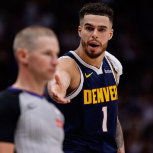 Denver Nuggets forward Michael Porter Jr. (1) gestures to referee Tyler Ford in the second quarter against the Oklahoma City Thunder during game four of the second round of the 2025 NBA Playoffs at Ball Arena.