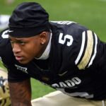 Colorado Buffaloes wide receiver Jimmy Horn Jr. (5) stretches before the game against the Baylor Bears at Folsom Field.
