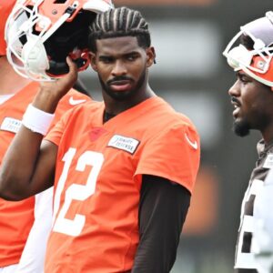 Cleveland Browns quarterback Shedeur Sanders (12) listens to a play call during mini camp at CrossCountry Mortgage Campus.