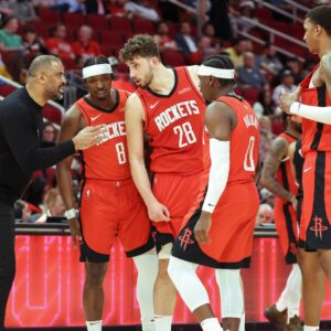 Apr 2, 2025; Houston, Texas, USA; Houston Rockets head coach Ime Udoka talks with players during the fourth quarter against the Utah Jazz at Toyota Center