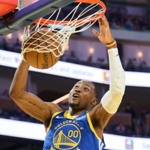 Dec 28, 2024; San Francisco, California, USA; Golden State Warriors forward Jonathan Kuminga (00) dunks the ball against the Phoenix Suns during the second quarter at Chase Center.