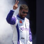 NASCAR Cup Series driver Bubba Wallace (23) waves after being introduced to fans before the start of the NASCAR Toyota / Save Mart 360 at Sonoma Raceway.