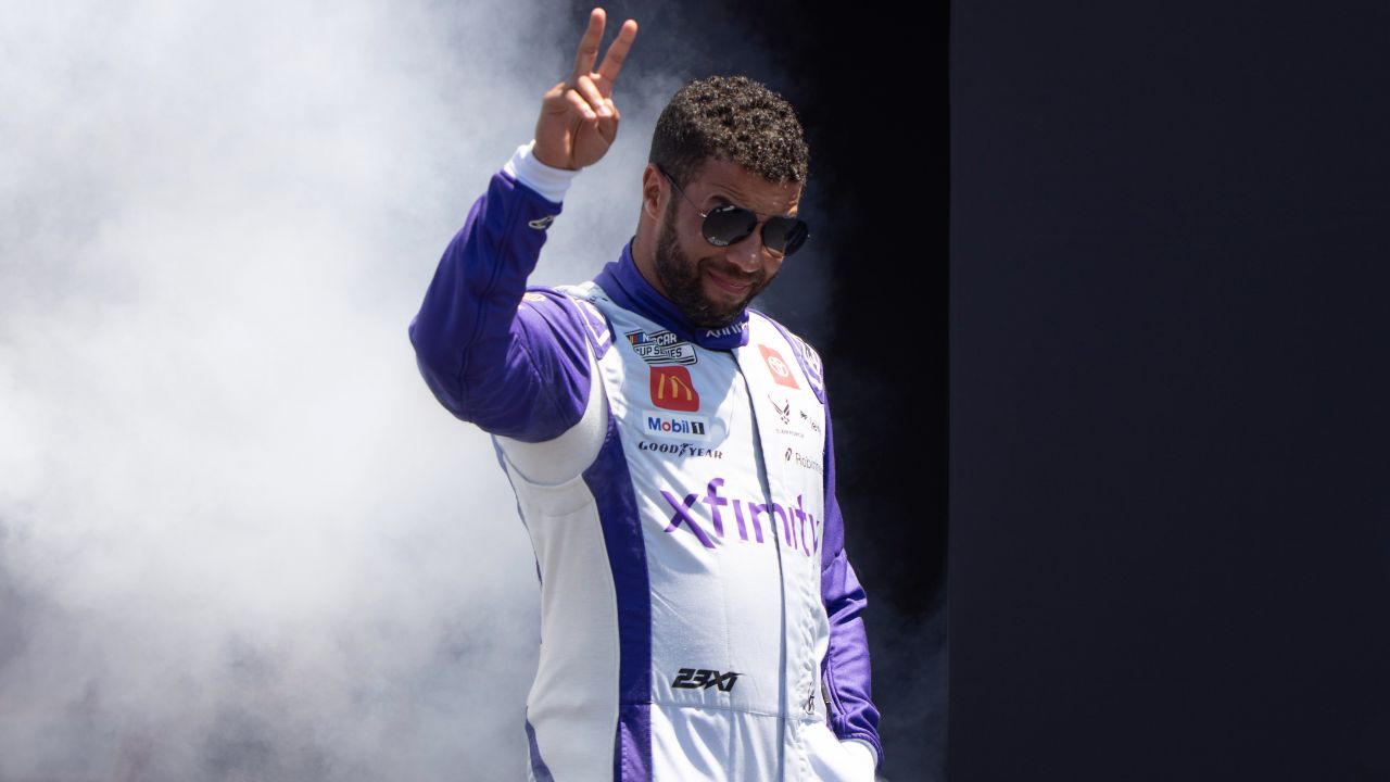 NASCAR Cup Series driver Bubba Wallace (23) waves after being introduced to fans before the start of the NASCAR Toyota / Save Mart 360 at Sonoma Raceway.