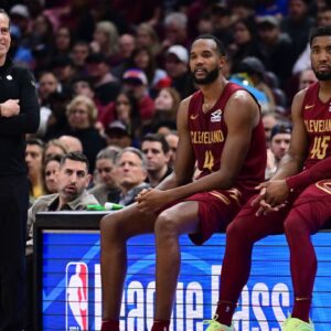 Cleveland Cavaliers forward Evan Mobley (4) and guard Donovan Mitchell (45) wait along side head coach Kenny Atkinson to enter the game during the first half against the New York Knicks at Rocket Arena.