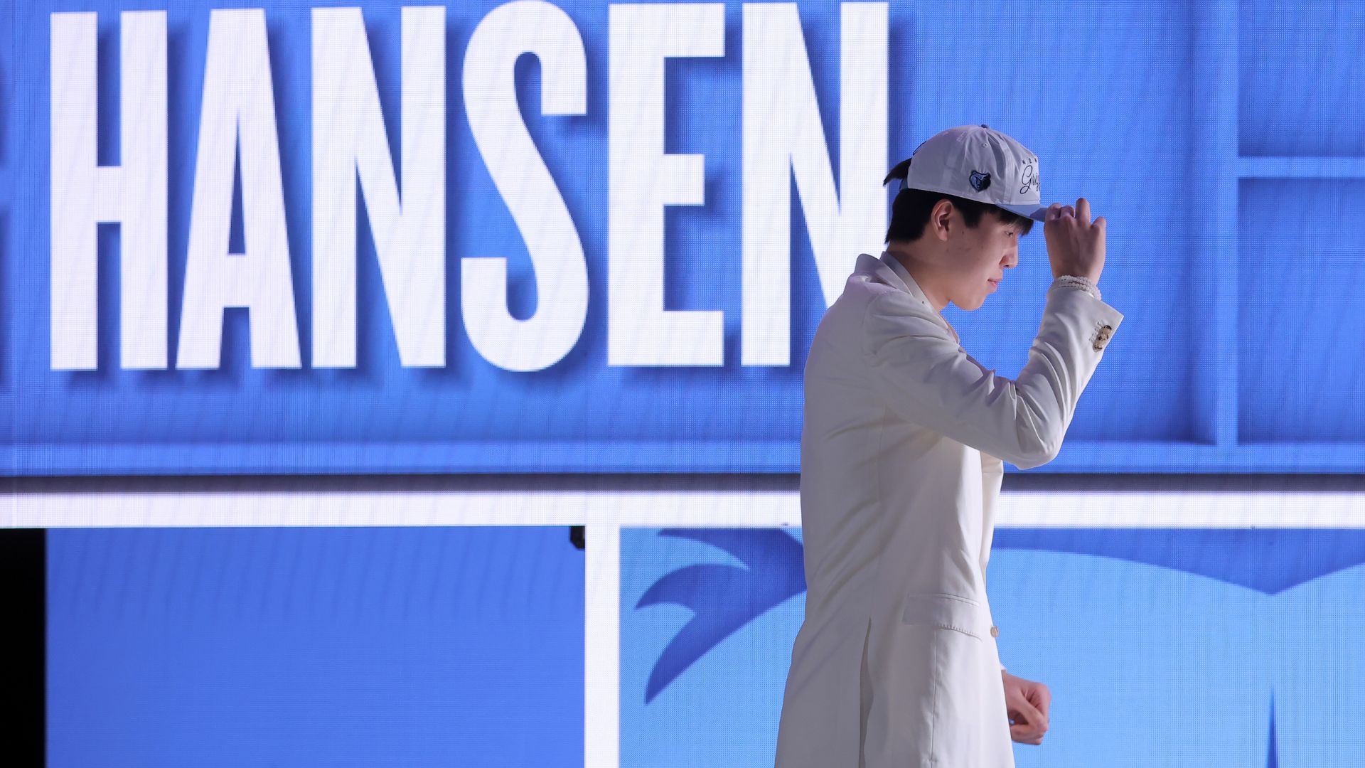 Jun 25, 2025; Brooklyn, NY, USA; Yang Hansen looks on after being selected as the 16th pick by the Memphis Grizzlies in the first round of the 2025 NBA Draft at Barclays Center.