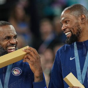 PARIS, Aug. 10, 2024 -- LeBron James (L) and Kevin Durant of gold medalists team USA attend the victory ceremony for the men s basketball at the Paris 2024 Olympic Games