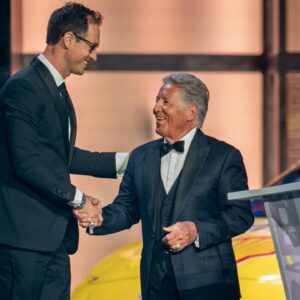 NASCAR Cup Series champion Joey Logano, left, is greeted by Mario Andretti, right, during the NASCAR Awards Show at Music City Center in Nashville, Tenn., Thursday, Dec. 1, 2022.