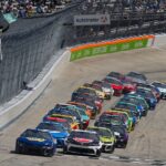 NASCAR Cup Series driver Chase Elliott (9) leads the field on a restart during the Autotrader EchoPark Automotive 400 at Dover Motor Speedway.