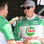 NASCAR Cup Series driver Ryan Preece (60) talks by his pit box Saturday, July 26, 2025, during qualifying for the Pennzoil 250 at Indianapolis Motor Speedway.