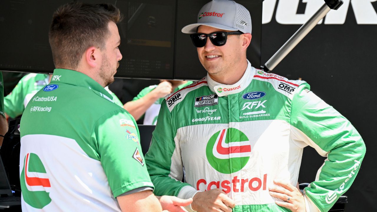 NASCAR Cup Series driver Ryan Preece (60) talks by his pit box Saturday, July 26, 2025, during qualifying for the Pennzoil 250 at Indianapolis Motor Speedway.