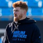 Dec 22, 2024; Charlotte, North Carolina, USA; Carolina Panthers quarterback Andy Dalton (14) during pregame warmups against the Arizona Cardinals at Bank of America Stadium.