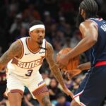 Phoenix Suns guard Bradley Beal (3) guards LA Clippers guard James Harden (1) during the second half at Footprint Center.