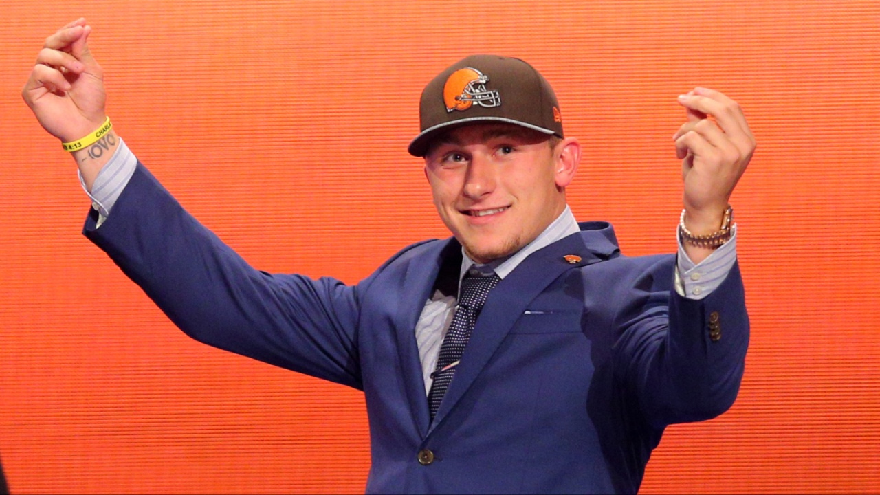 Johnny Manziel (Texas A&M) gestures on stage after being selected as the number twenty-two overall pick in the first round of the 2014 NFL Draft to the Cleveland Browns at Radio City Music Hall.