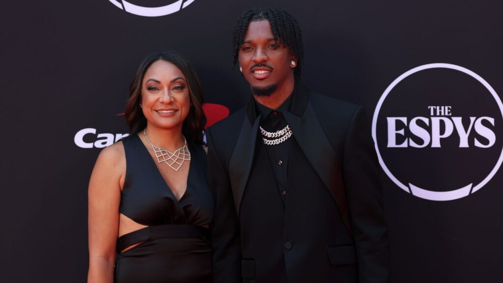 Washington Commanders quarterback Jayden Daniels and his mother Regina Jackson arrive on the red carpet before the 2024 ESPYS at Dolby Theatre.