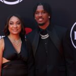 Washington Commanders quarterback Jayden Daniels and his mother Regina Jackson arrive on the red carpet before the 2024 ESPYS at Dolby Theatre.
