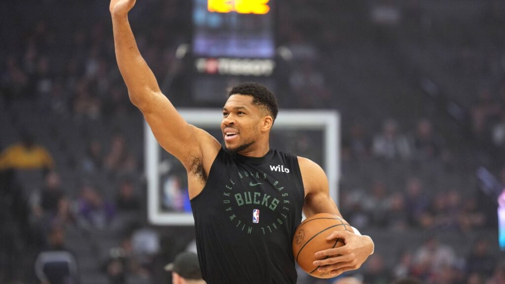 Milwaukee Bucks forward Giannis Antetokounmpo (34) waves before the game against the Sacramento Kings at Golden 1 Center.