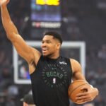 Milwaukee Bucks forward Giannis Antetokounmpo (34) waves before the game against the Sacramento Kings at Golden 1 Center.